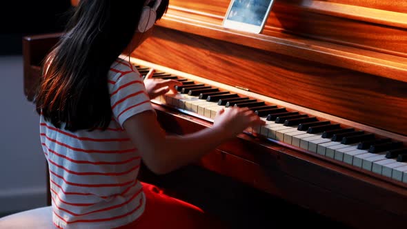 Girl playing piano 4k