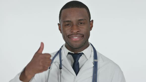 Thumbs Up By African Doctor, White Background