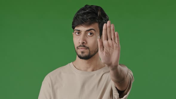 Portrait Young Guy Brunet Indian Man Serious Offended Male Model Stands Over Green Background Puts