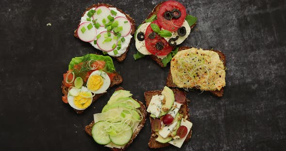 Healthy Vegan Sandwiches Made From Homemade Buckwheat Bread with Various Toppings