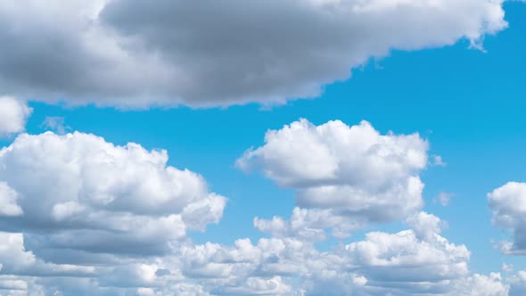 Cumulus Cirrus Clouds Move in the Blue Sky. Time Lapse.