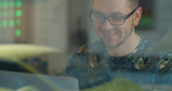 Man Freelancer Using Laptop Online Working in Internet, Guy Typing on Computer Surfing Web Looking