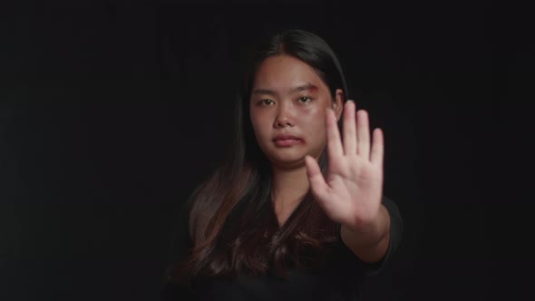 Stopping Violence Against Women With Black Background 