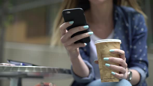 Woman texting on a smart phone