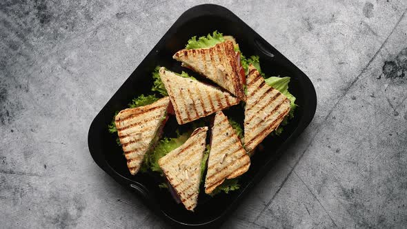 Appetizing Fresh and Healthy Grilled Club Sandwiches with Ham and Cheese