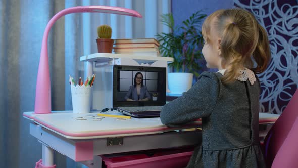 Online Lesson at Home Teen Child Girl Student Study with Woman Teacher on Video Chat Using Laptop