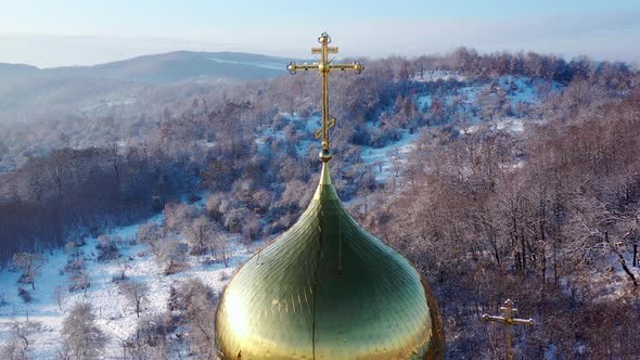 Beautiful golden dome of an Orthodox Church in the Carpathian Mountains