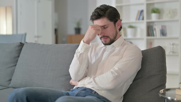 Disappointed Man Feeling Worried at Home