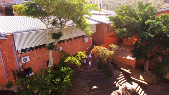 Group of kids getting down from staircase