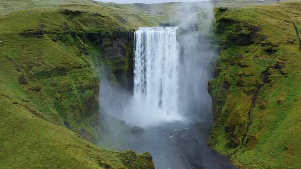 Skogafoss Waterfall on Skoga River on South Iceland in Summer  Aerial Drone Footage