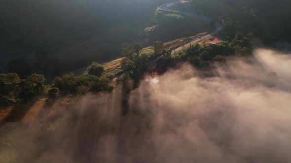 4K Aerial view of Mountains landscape with morning fog.