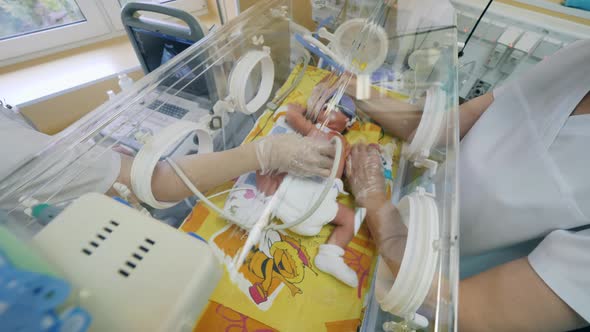 Doctors Check Baby with Ultrasound at a Hospital.