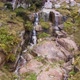 Waterfall in Rocky High Mountains in Cloud Weather - VideoHive Item for Sale