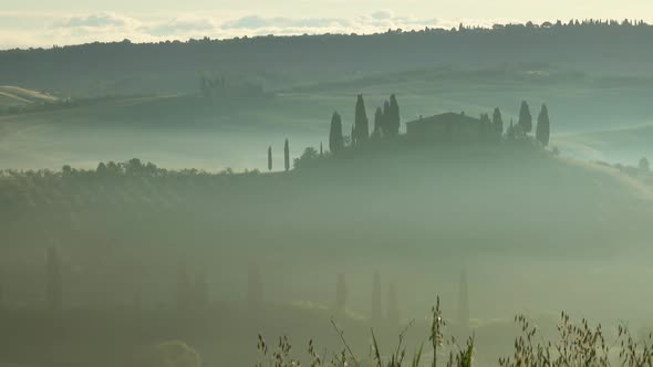 Tuscany Landscape at Sunrise with Farm and Hills