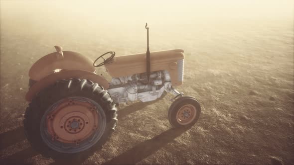 Vintage Retro Tractor on a Farm in Desert alt