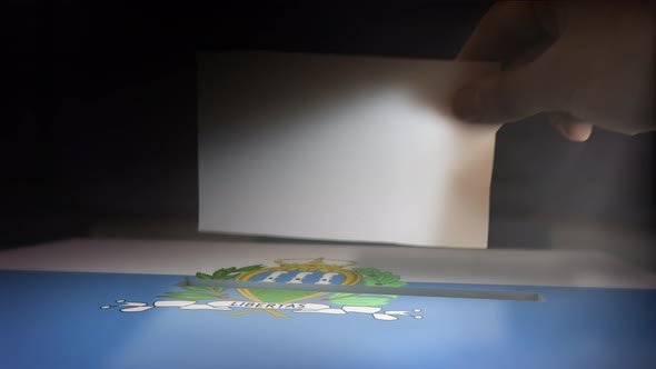 Digital Composite Hand Voting To National Flag OF San Marino 