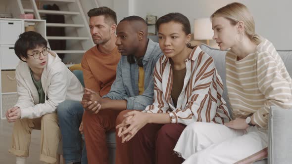 Multiethnic Friends Talking on Couch