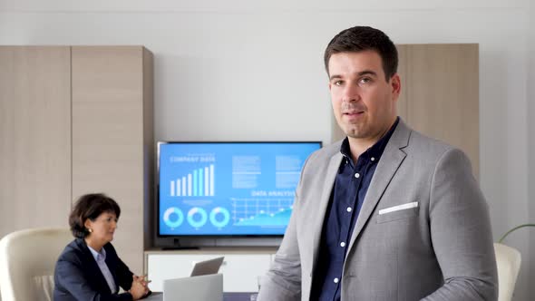 Businessman in Meeting Room Rehearsing