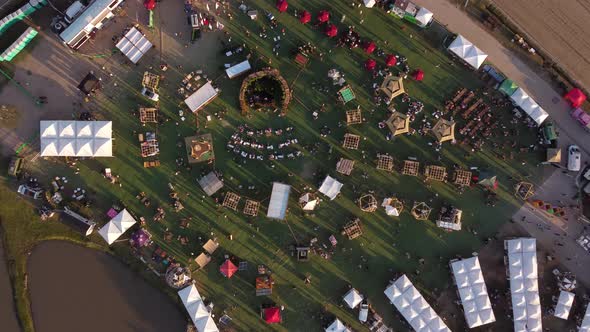 A dynamic top down descending aerial footage towards the Feria Masticar food festival in Buenos Aire