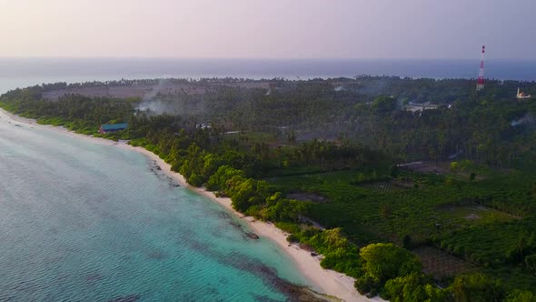 Aerial sky of resort beach wildlife by clear lagoon with sand background