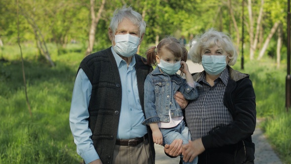 Family of Grandparents Takes Off Medical Masks After Coronavirus Quarantine End