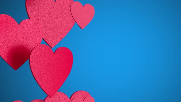 Pink heart flying on blue background