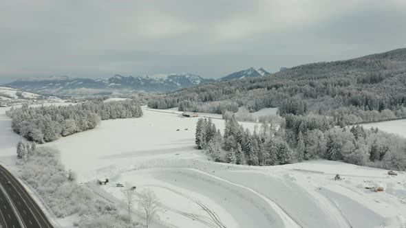 Aerial of serene snow covered winter landscape