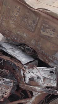 Vertical Video of a Dump of Destroyed Cars During the War in Ukraine