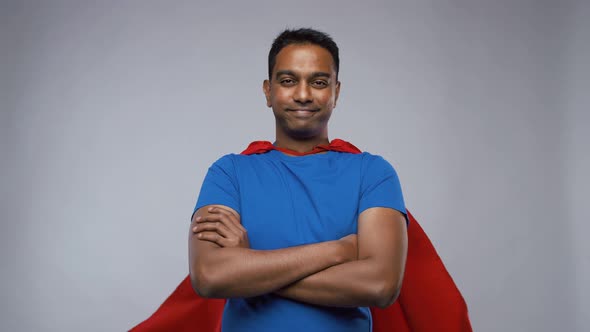 Indian Man in Superhero Cape Showing Thumbs Up