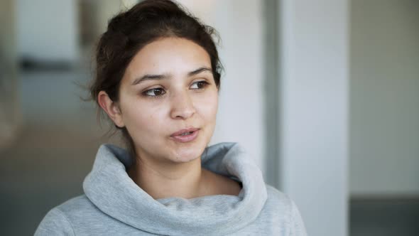 Cheerful Young Woman Talking 