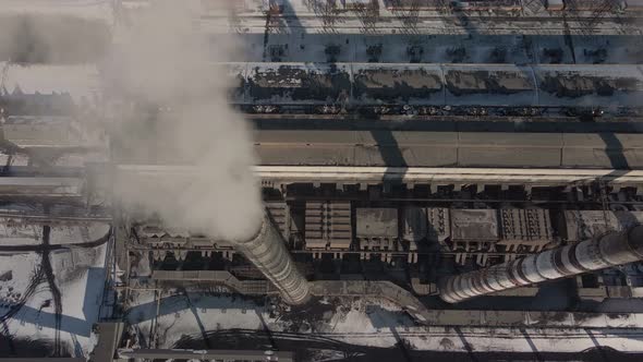 Aerial View of High Chimney Pipes with Grey Smoke From Coal Power Plant