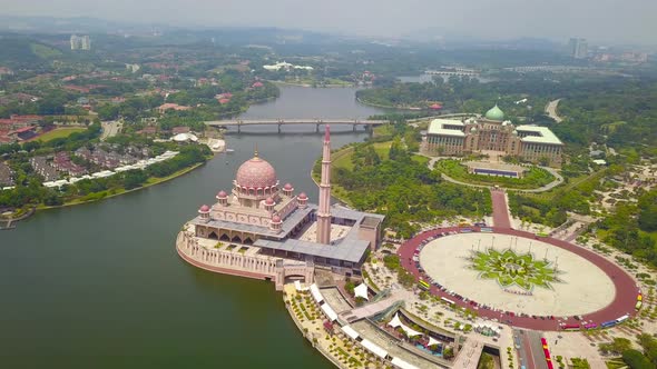 Aerial view of Putra mosque with garden landscape design and Putrajaya Lake, Putrajaya