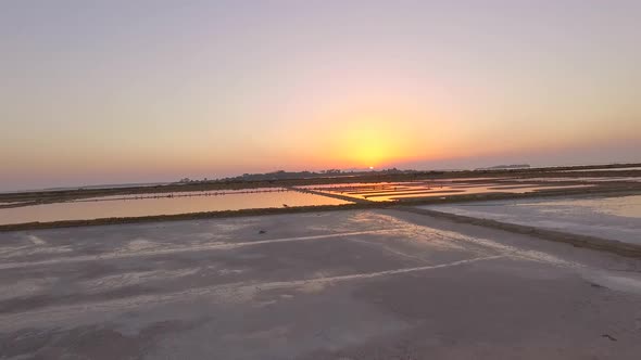 Aerial view of a lake at sunset.