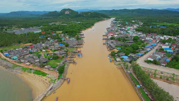 An aerial view over the river, fishing villages and fishing boats