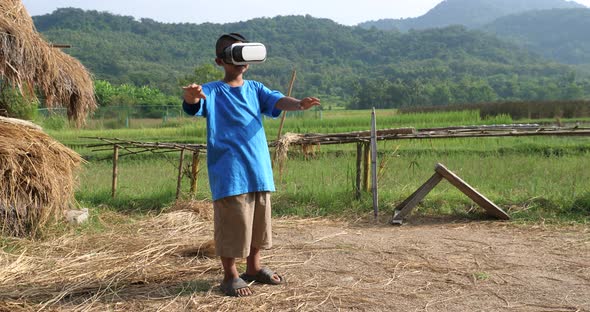 Rural Little Boy Wearing VR Headset alt
