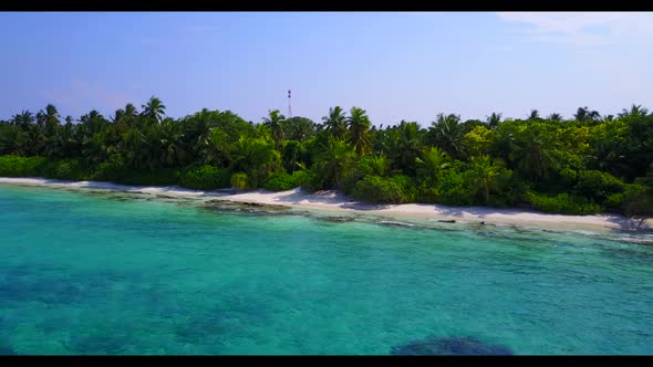Aerial drone view travel of tranquil sea view beach adventure by clear lagoon with white sand backgr