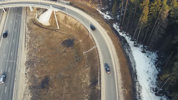 Automobile Highway with a Roundabout of Vehicles View From a Quadcopter