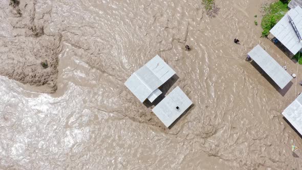 Aerial View of a Flood and Flooded Houses