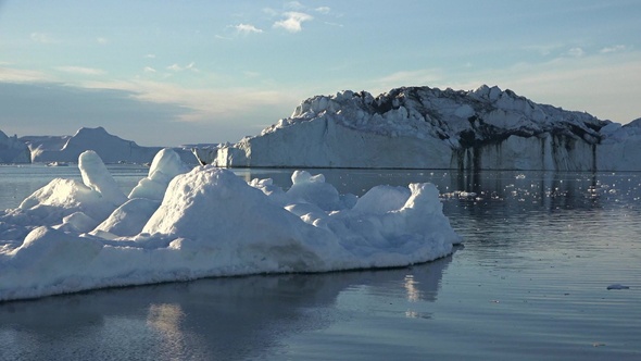 Greenland. Sailing Among Awesome Icebergs, Disko Bay. Lifestyle. Boat sailing among icebergs.