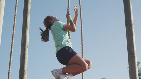 Caucasian girl training at boot camp