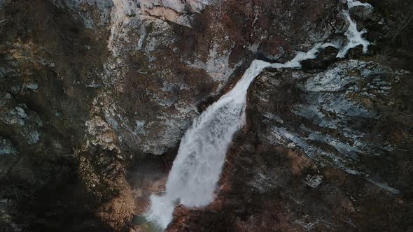 The beautiful Albanian waterfall skakavica from above with a drone.