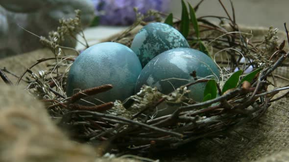 Pan Camera Movement on Easter Nest with Dyed Blue Eggs