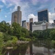 POV Timelapse shows People enjoy the Pond at Central Park in a sunny afternoon - VideoHive Item for Sale