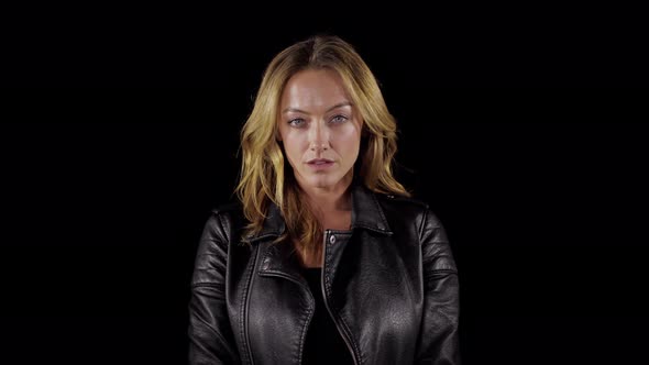 Sexy woman in a leather jacket