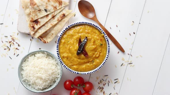 Indian Popular Food Dal Fry or Traditional Dal Tadka Curry Served in Bowl