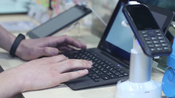 Man Uses Modern Computer Equipment