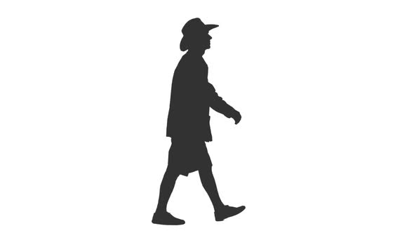 Silhouette of Walking Man Tourist in Shorts and Cowboy Hat alt