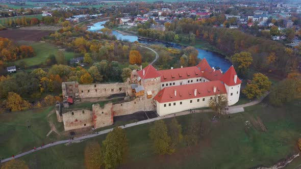 Bauska Medieval Castle Ruins Complex and Park From Above Aerial Shot 4K Video