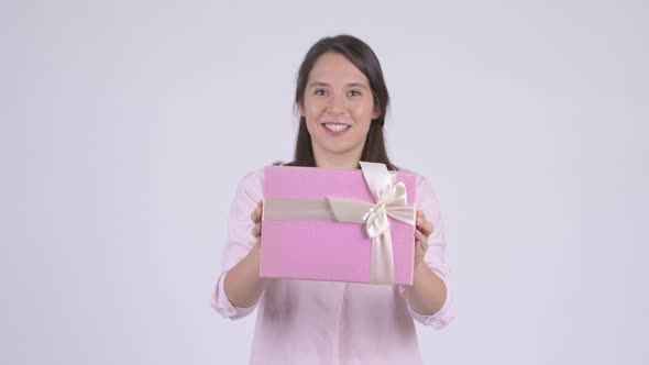 Young Happy Multiethnic Businesswoman Giving Gift Box