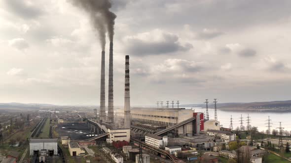 Aerial Footage of the Power Plant Using Water From a Pond to Create Electricity